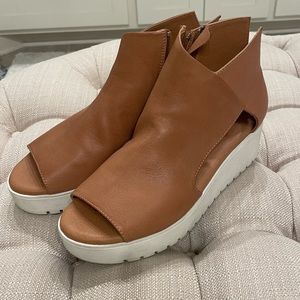 Silent D platform sandals.